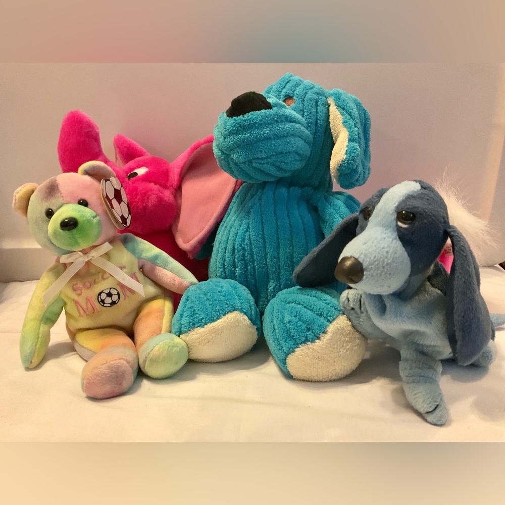 4 stuffed animals: blue dogs, hot pink elephant dog & soccer mom multicolor bear